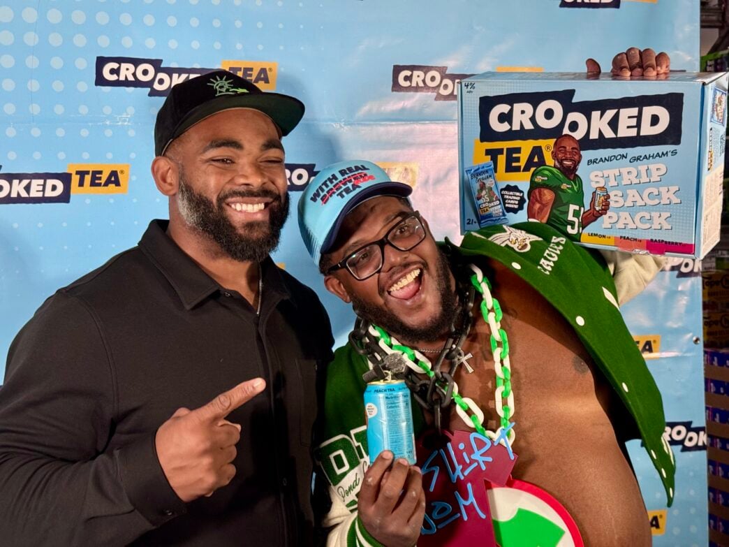 retired eagles player brandon graham with local hype man noshirt dom
