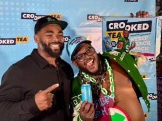 retired eagles player brandon graham with local hype man noshirt dom
